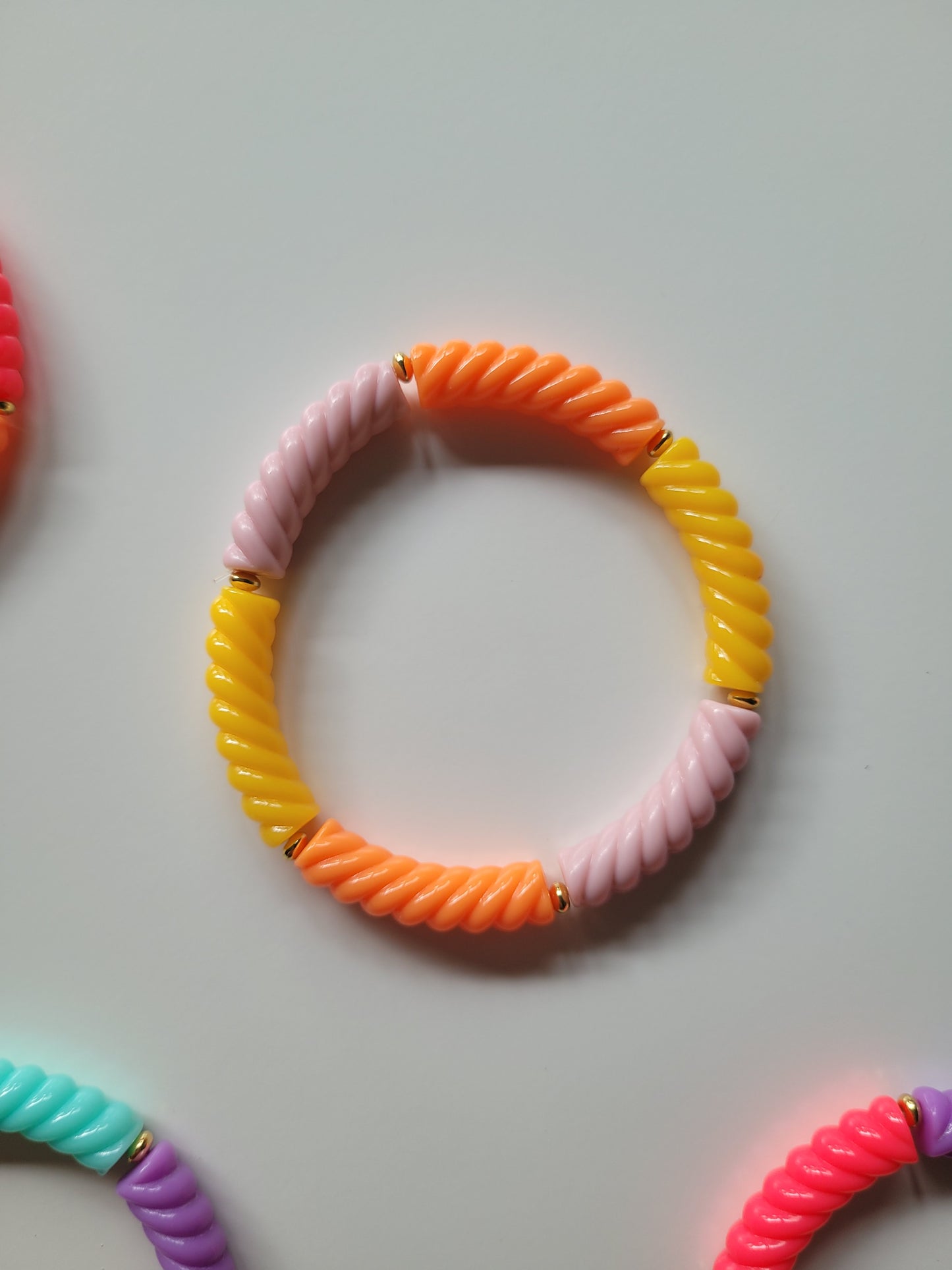 Ribbelarmbandjes met klein goud