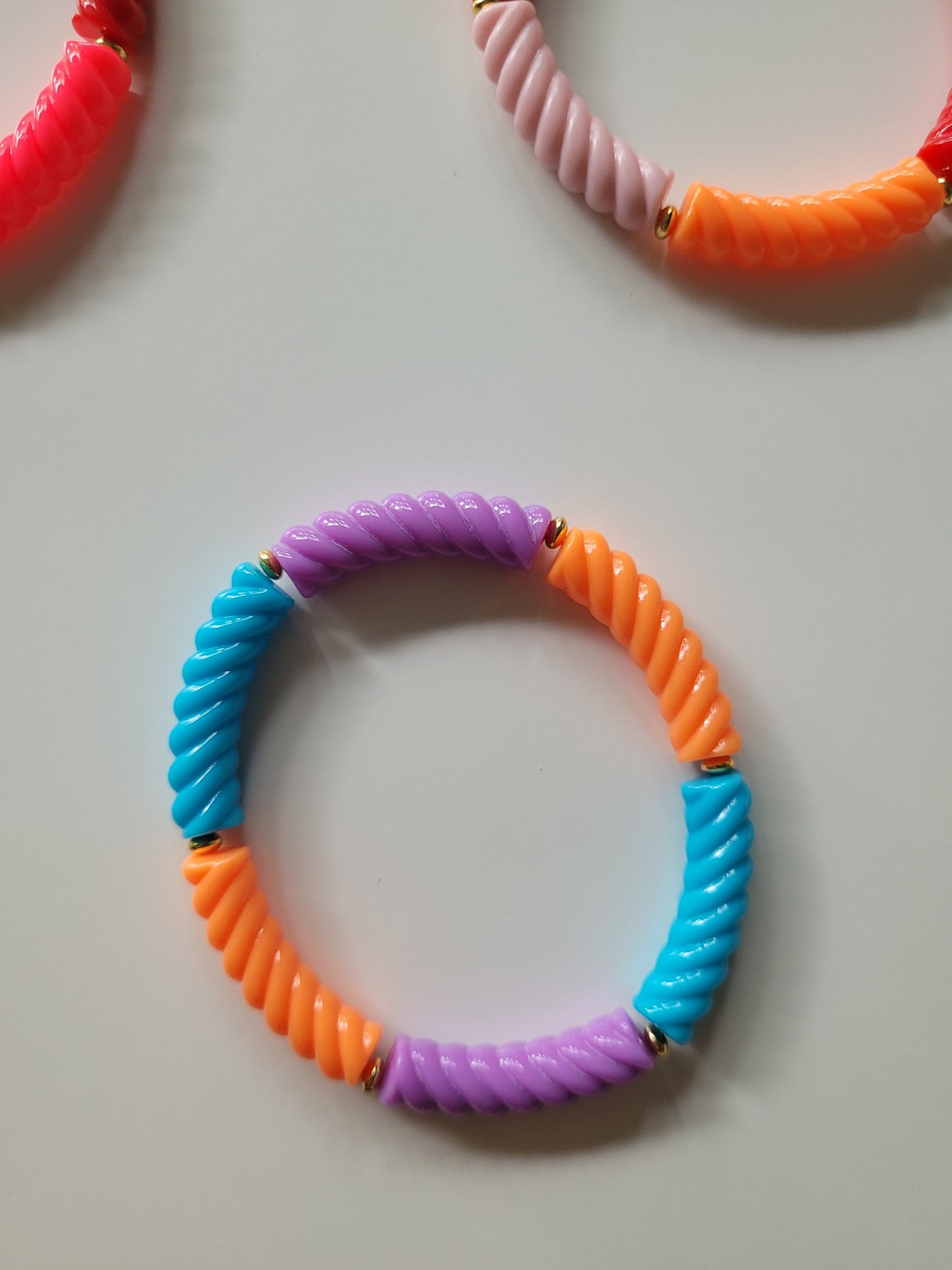 Ribbelarmbandjes met klein goud
