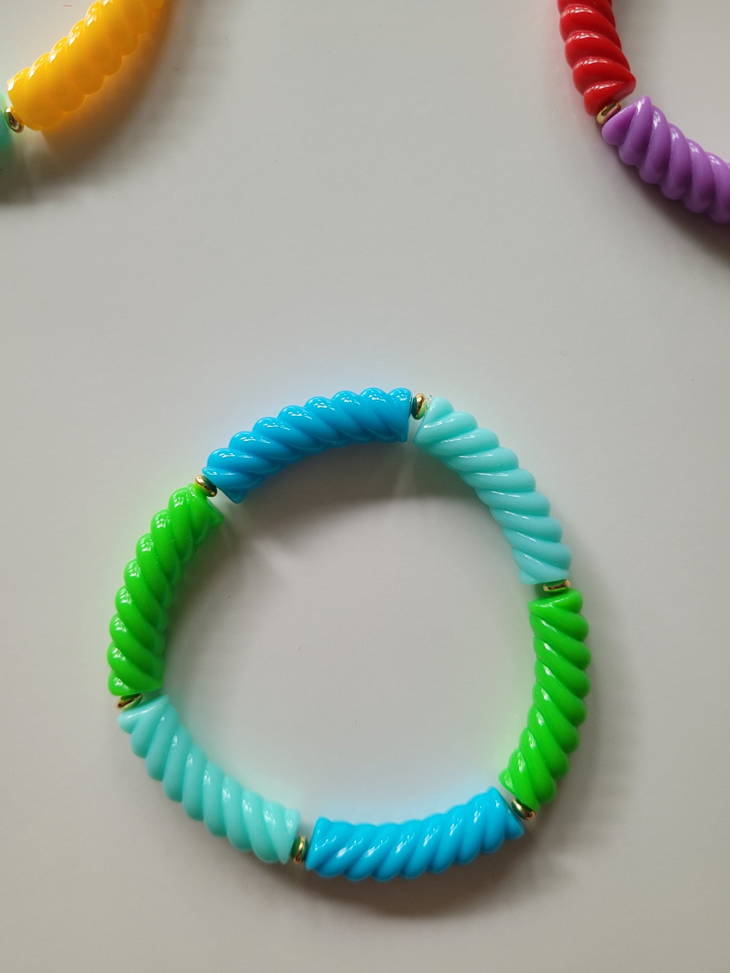Ribbelarmbandjes met klein goud