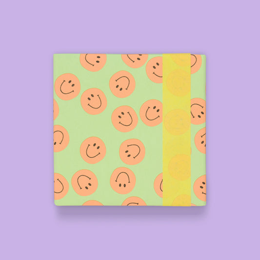 Inpakpapier geel met smileys